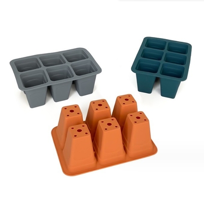 Plantation pratique avec des plateaux de démarrage de semences en silicone réutilisables et des plateaux de pépinière